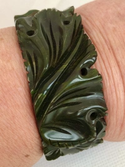 Bakelite Green Carved Clamper